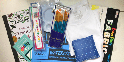 Sample of an Art Therapy Kit with fabric markers, a t-shirt to decorate, and watercolor supplies.