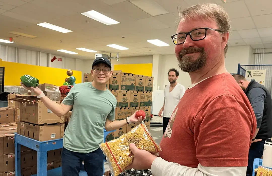 Volunteers packing food at a food pantry