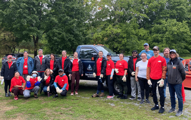 Volunteers outdoors for an environmental conservation project.