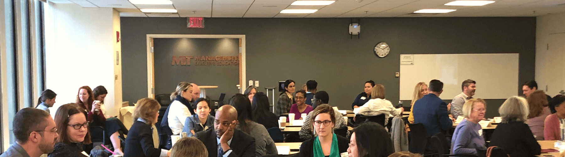 Classroom of MIT Executive MBA students participating in the Leading with Impact Program.