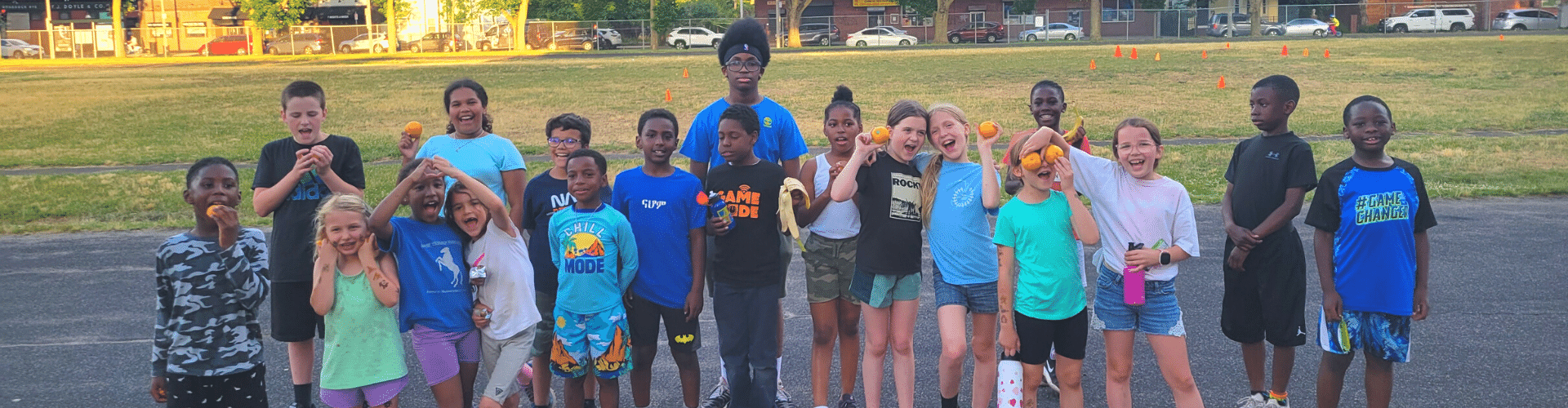 Youth from YES posing and holding up their Nutrition and Hydration Kits